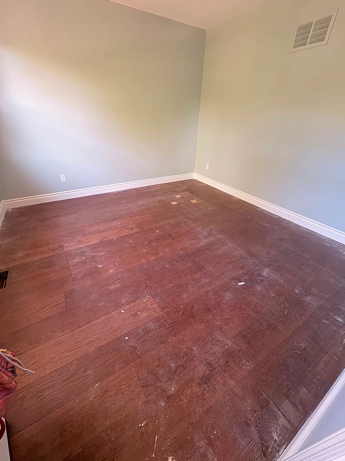Before — Dust removal and floor detailing after renovation work.